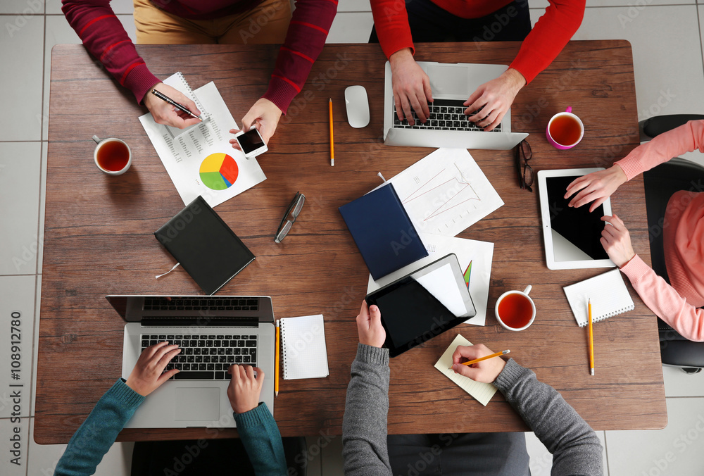 Business meeting at the table, top view