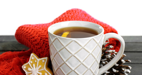 Poster - Beautiful winter composition with cup of hot drink, on wooden table with white background