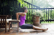 © Johnér - Mature woman exercising on balcony