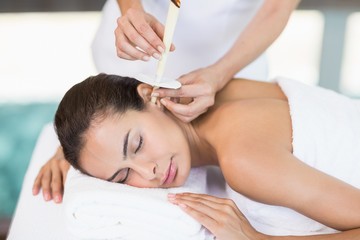 Young woman receiving spa treatment