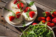 Multigrain Rice Cakes With Strawberries Fruit , Soft Mascarpone Cheese And Arugula For Healthy Breakfast.