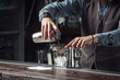 © Dmytro Panchenko - Barman making cocktails closeup.