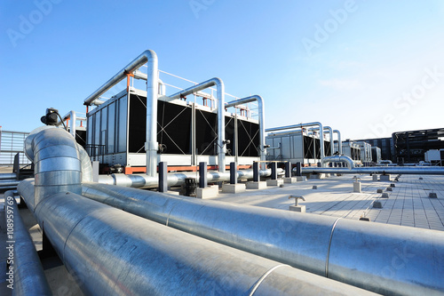 Fotomural Sets of cooling towers in data center building.