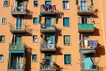 Italian Apartment Building In The Suburbs With Clothes Hanging