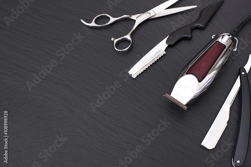 Fotografie, Obraz Barber shop tools on Black with place for text.