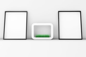 Poster - Blank Picture Frames with Grass in White Ceramics Planter on the