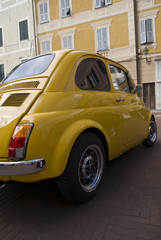 Wall Mural - Classic car parked in a street