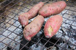 grilled sweet potato on charcoal grill