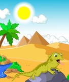 Fototapeta Dinusie - lizard cartoon with desert and pyramid background
