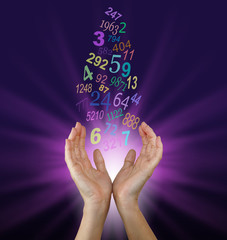 Seeking Guidance from the Numbers - Female cupped hands reaching up towards a flow of  multicolored numbers, with a burst of magenta light behind on a dark purple background 
