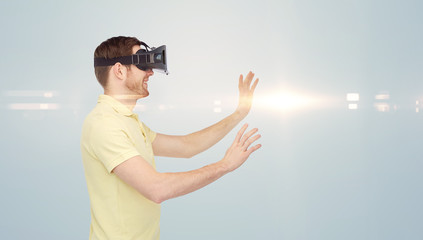 Wall Mural - happy man in virtual reality headset or 3d glasses