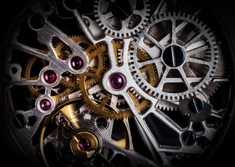 Mechanism, clockwork of a watch with jewels, close-up. Vintage luxury