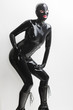 © Richard Semik - standing woman wearing latex clothes
