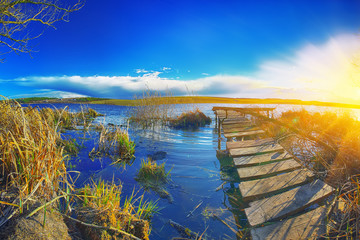 Wall Mural - docks on the lake at sunset