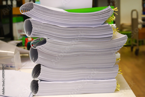Many Piles Of Papers On The Desk Buy This Stock Photo And