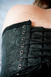 © pixarno - détail dos de femme avec corset