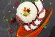 © z10e - Rice with octopus and curry sauce over stone table