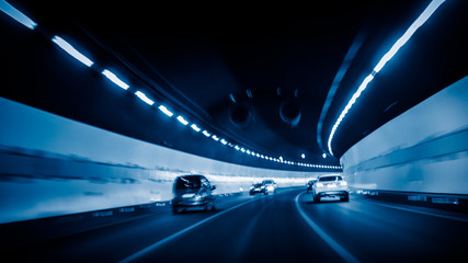 car driving through tunnel