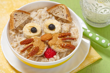 Wall Mural - Funny oatmeal with cat face decoration