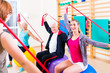 © Kzenon - Senior people at fitness course in gym