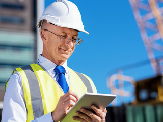 Engineer builder at construction site