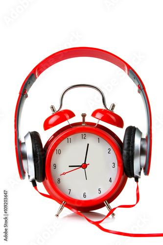 Full Size Wired Headphones Dressed On A Clockwork Alarm Clock On