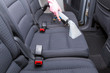Car interior textile seats chemical cleaning with professionally extraction method. Early spring cleaning or regular clean up.