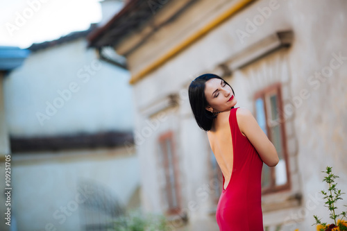 Beautiful Girl With Dark Hair Big Eyes And Dark Eyebrows Wearing
