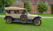 Vintage 1914 Sunbeam Motor Car In Front Of Old Building.