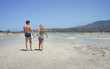 © Tanouchka - Beautiful young couple walking on the beach