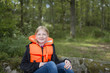 © Johnér - Girl wearing life jacket