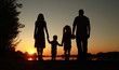 © Kostia - silhouette of a happy family with children