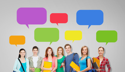 Wall Mural - group of teenage students with folders and bags