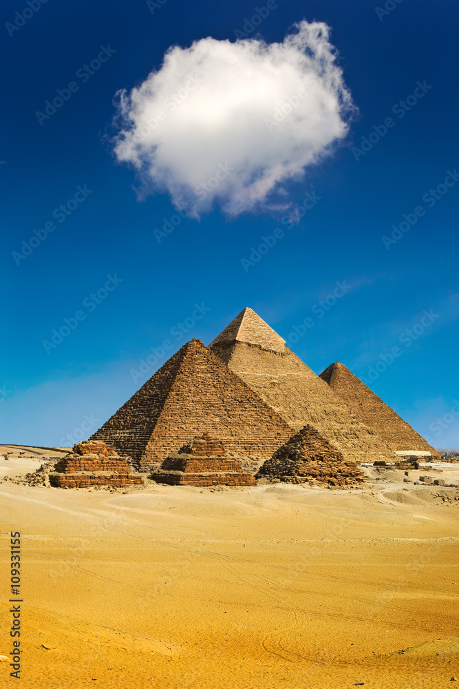 Egypt. Cairo - Giza. General view of pyramids from the Giza Plateau (from left: the Pyramid of Mykerinos, Chephren and Cheops and three small pyramids known as Queens' Pyramids on front side) - obrazy, fototapety, plakaty 