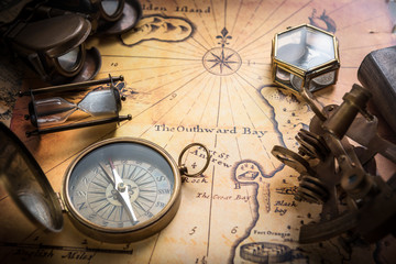 Fototapete - Old compass, sextant on vintage map. Retro style.