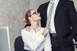 © sakkmesterke - Young secretary pulling boss tie