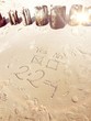 Równanie matematyczne napisane na piasku