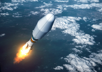 Wall Mural - heavy carrier rocket launch in the clouds