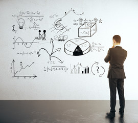 Poster - Businessman looking at sketch