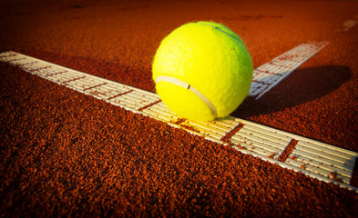 Wall Mural - Tennis balls on a tennis clay court