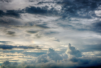 Wall Mural - Gray storm clouds at dusk during the rainy season of Thailand.