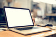 © guteksk7 - Laptop with blank screen on table - whole laptop is sharp.