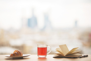 Wall Mural - Desktop with tea and book