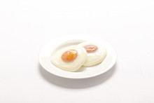 Two Fried Eggs With Yellow Yolks On White Plate
