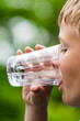 © Mikkel Bigandt - Boy drinking fresh water from glass