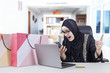 © Creativa Images - Muslim woman angry after shopping online