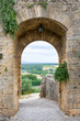 Medieval Doorway Leading to Tuscan Countryside in Italy
