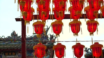 Wall Mural - HD video Chinese red lanterns. Illuminate lamps to celebrate Chinese New Year. Beautiful night scene of temple in Taiwan China