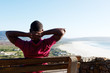 © mimagephotos - Young african guy on a vacation