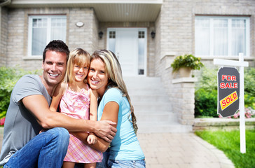 Wall Mural - Happy family near new house.